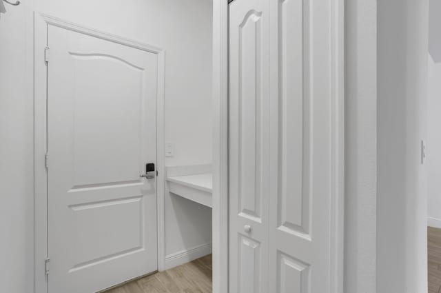 3974 SW Jarmer Rd, Port Saint Lucie, FL 34953 - detailed view of wood finished floors and baseboards