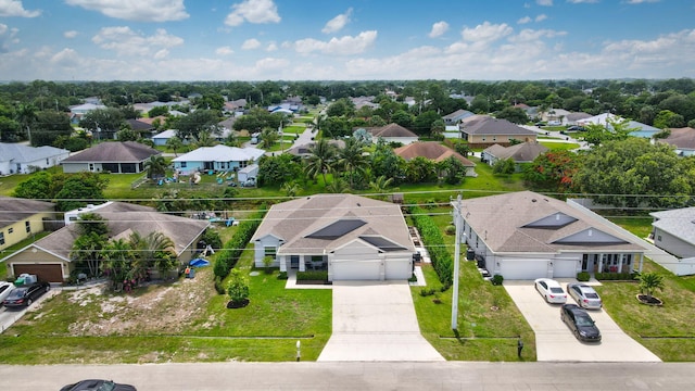 3974 SW Jarmer Rd, Port Saint Lucie, FL 34953 - aerial perspective of suburban area