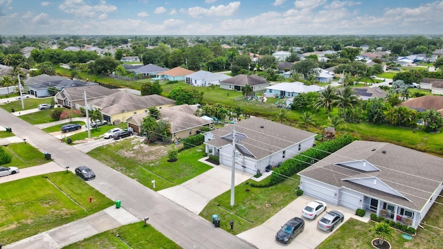 3974 SW Jarmer Rd, Port Saint Lucie, FL 34953 - aerial perspective of suburban area