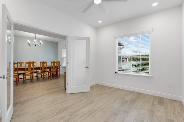 3974 SW Jarmer Rd, Port Saint Lucie, FL 34953 - dining area featuring light wood finished floors, a chandelier, ceiling fan, baseboards, and recessed lighting