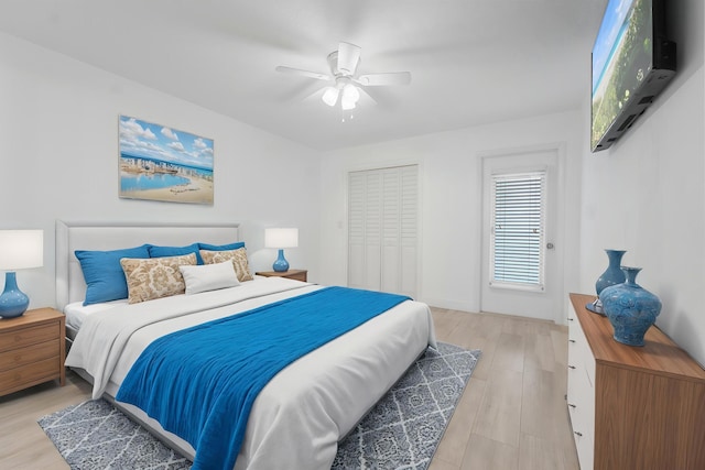 109 Wettaw Ln Unit 103, North Palm Beach, FL 33408 - bedroom with light wood-type flooring and a ceiling fan