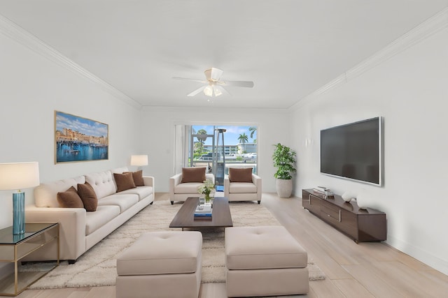 109 Wettaw Ln Unit 103, North Palm Beach, FL 33408 - living area featuring crown molding, ceiling fan, wood finished floors, and baseboards