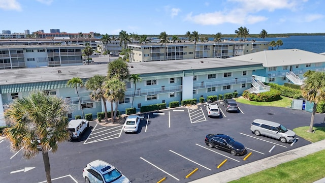 109 Wettaw Ln Unit 103, North Palm Beach, FL 33408 - view of building exterior featuring uncovered parking