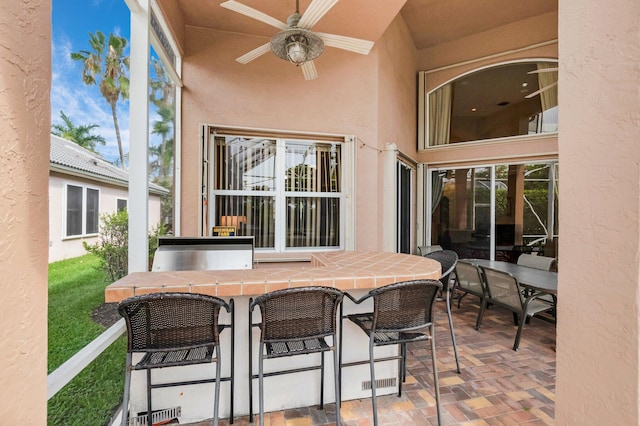 12373 Cascades Pointe Dr, Boca Raton, FL 33428 - view of patio featuring ceiling fan and outdoor dining area