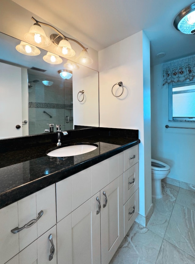 3524 Via Poinciana Unit 604, Greenacres, FL 33467 - full bath with marble look tile flooring, vanity, toilet, a shower, and baseboards