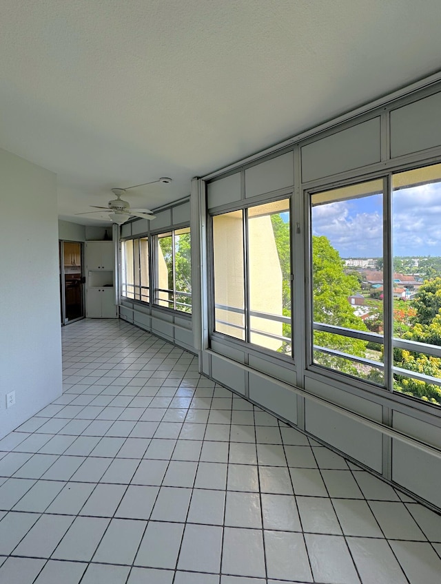 3524 Via Poinciana Unit 604, Greenacres, FL 33467 - unfurnished sunroom with a ceiling fan