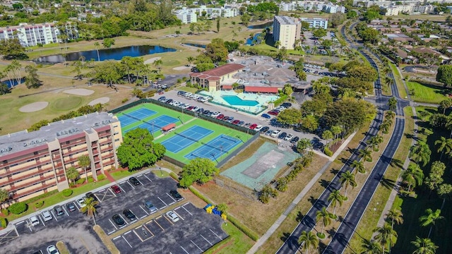 3524 Via Poinciana Unit 604, Greenacres, FL 33467 - aerial view of a large body of water, a pool, apartment complex / building, and a golf course