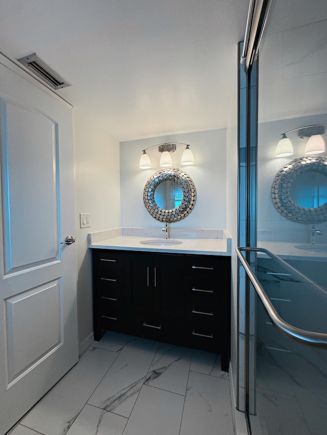 3524 Via Poinciana Unit 604, Greenacres, FL 33467 - bathroom featuring vanity, marble finish floors, and baseboards