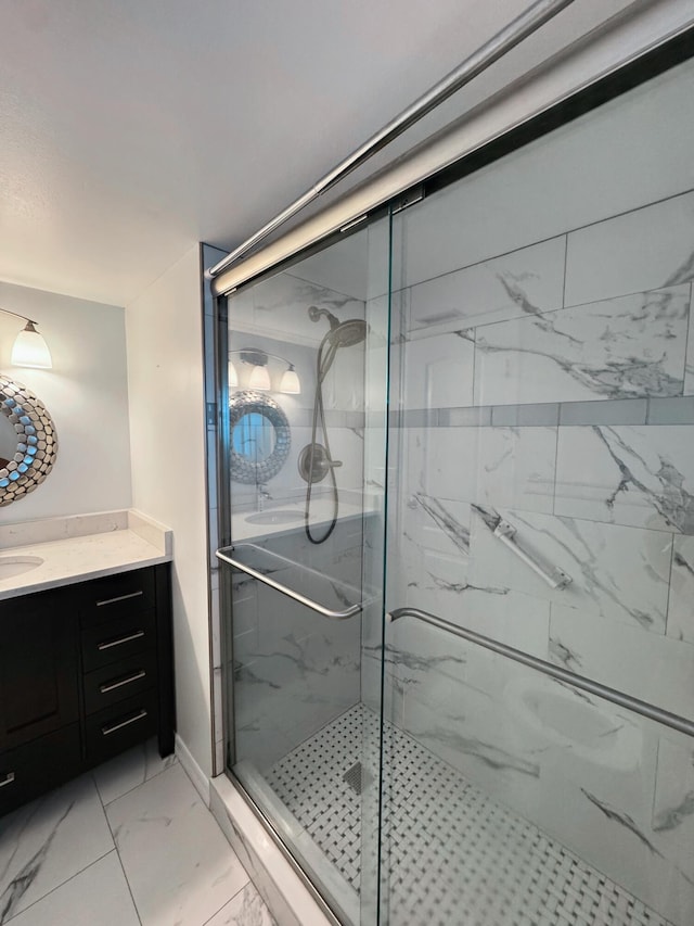 3524 Via Poinciana Unit 604, Greenacres, FL 33467 - bathroom featuring marble finish flooring, vanity, and a marble finish shower