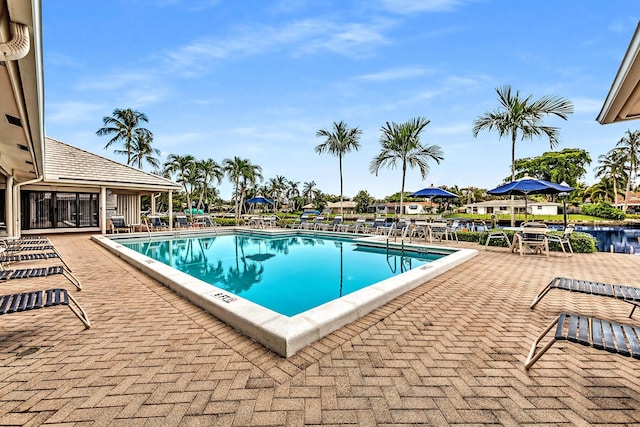 180 Cypress Club Dr Unit 813, Pompano Beach, FL 33060 - community pool featuring a patio