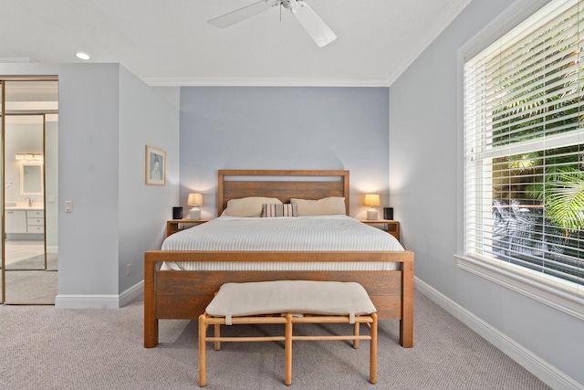 2683 SW Greenwich Way, Palm City, FL 34990 - carpeted bedroom featuring ornamental molding, a sink, baseboards, and ceiling fan