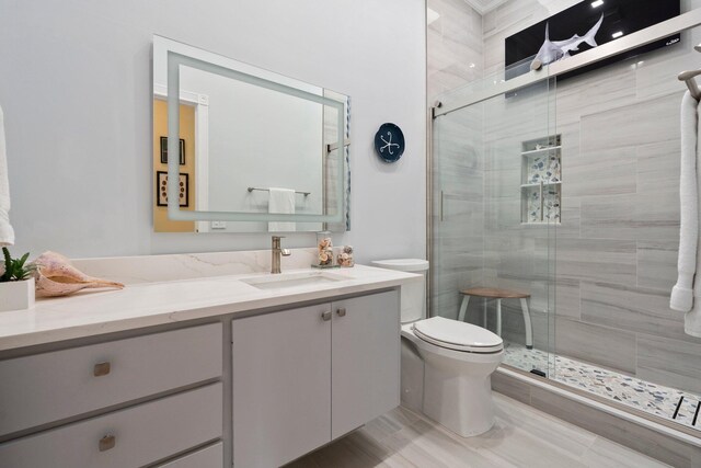 2683 SW Greenwich Way, Palm City, FL 34990 - bathroom featuring vanity, toilet, and a stall shower