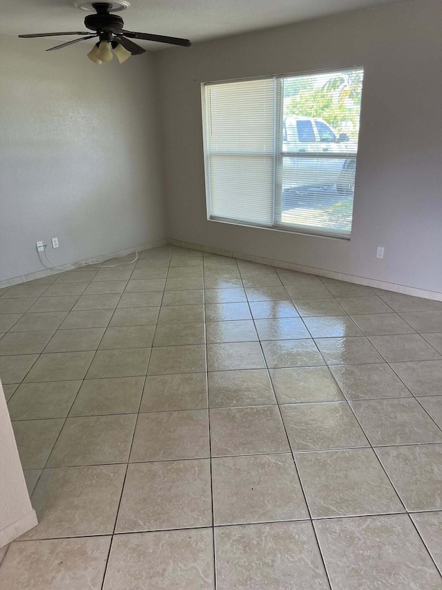 318 NW Byron St, Port Saint Lucie, FL 34983 - tiled empty room with ceiling fan