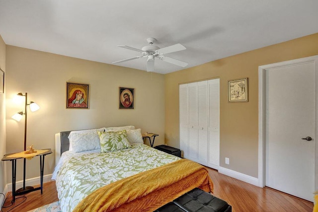 10112 Marwood Pl, Boynton Beach, FL 33437 - bedroom featuring wood finished floors, baseboards, a closet, and ceiling fan