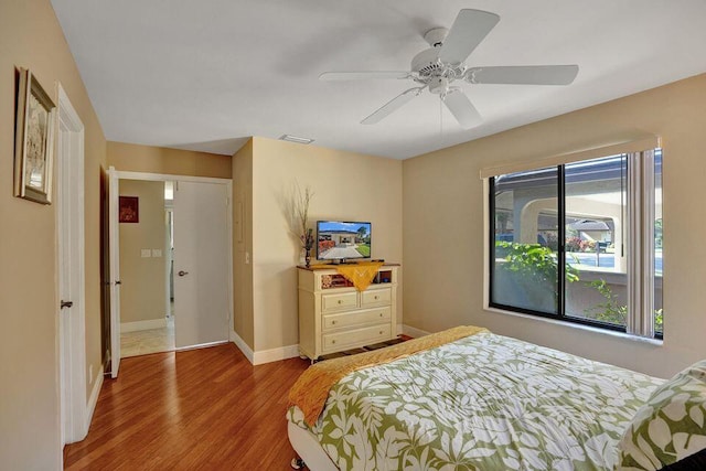 10112 Marwood Pl, Boynton Beach, FL 33437 - bedroom with wood finished floors, baseboards, and ceiling fan