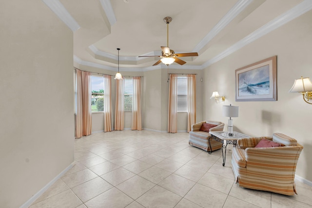 6908 Adriano Dr, Boynton Beach, FL 33437 - sitting room featuring crown molding, a ceiling fan, baseboards, light tile patterned flooring, and a raised ceiling