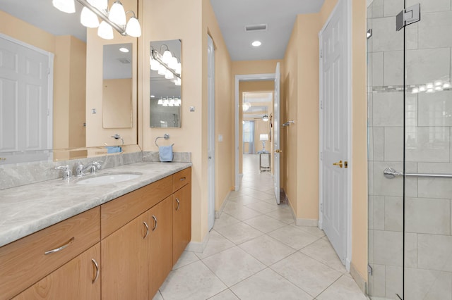 6908 Adriano Dr, Boynton Beach, FL 33437 - full bath with tile patterned flooring, vanity, baseboards, and tiled shower