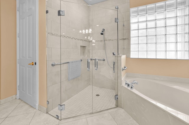 6908 Adriano Dr, Boynton Beach, FL 33437 - bathroom featuring a garden tub, tile patterned floors, and a stall shower
