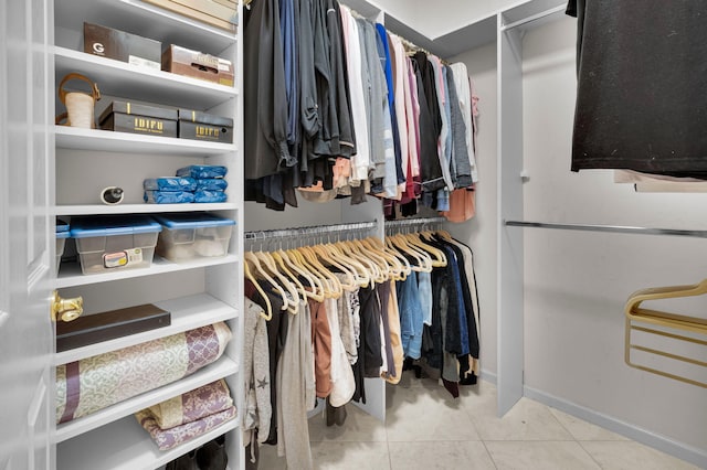 6908 Adriano Dr, Boynton Beach, FL 33437 - spacious closet featuring tile patterned flooring