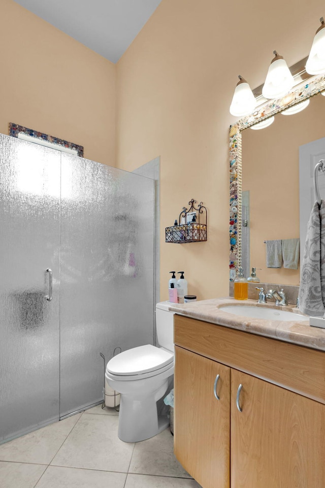 6908 Adriano Dr, Boynton Beach, FL 33437 - full bathroom featuring tile patterned flooring, vanity, toilet, and a shower with door