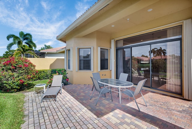 6908 Adriano Dr, Boynton Beach, FL 33437 - view of patio featuring outdoor dining space