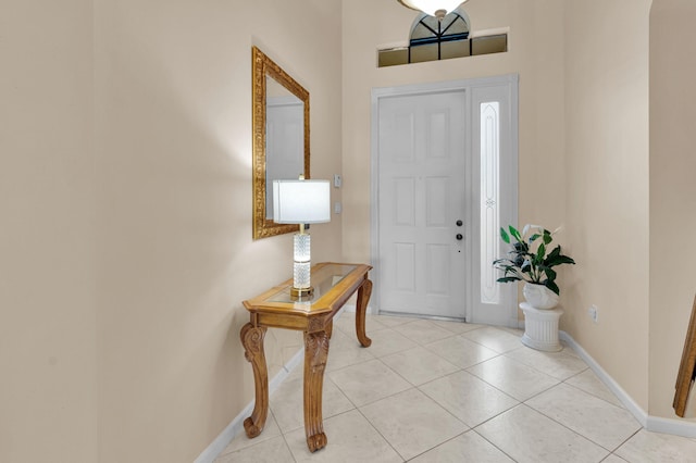 6908 Adriano Dr, Boynton Beach, FL 33437 - foyer entrance featuring baseboards and light tile patterned floors
