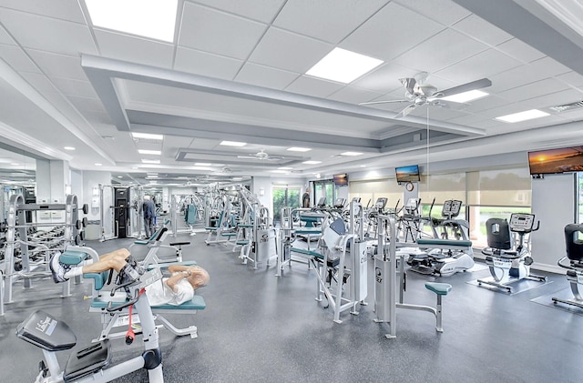 6908 Adriano Dr, Boynton Beach, FL 33437 - gym featuring ceiling fan and a tray ceiling