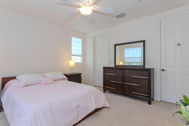 433 Amador Ln Unit 1, West Palm Beach, FL 33401 - bedroom featuring light colored carpet and a ceiling fan