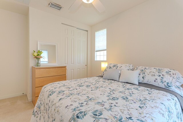 433 Amador Ln Unit 1, West Palm Beach, FL 33401 - bedroom featuring light carpet, baseboards, a closet, and a ceiling fan