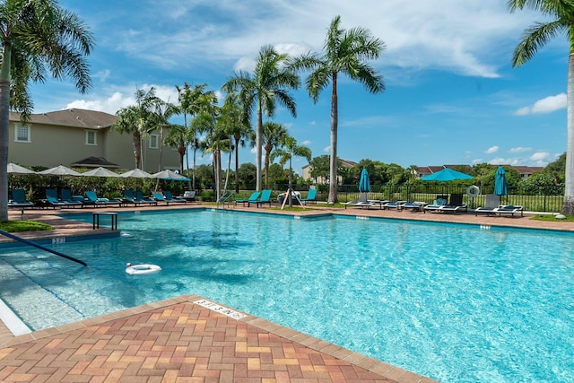 433 Amador Ln Unit 1, West Palm Beach, FL 33401 - community pool with a patio area