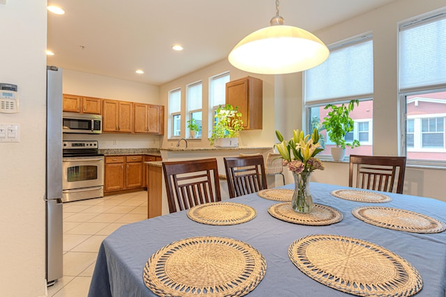 433 Amador Ln Unit 1, West Palm Beach, FL 33401 - dining space featuring healthy amount of natural light, recessed lighting, and light tile patterned floors