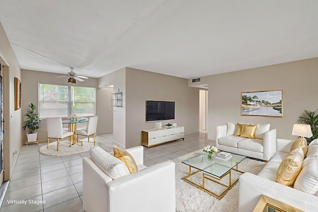 393 Fanshaw J, Boca Raton, FL 33434 - living area with light tile patterned floors and a ceiling fan