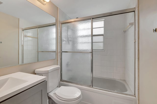393 Fanshaw J, Boca Raton, FL 33434 - full bathroom with toilet, vanity, and enclosed tub / shower combo