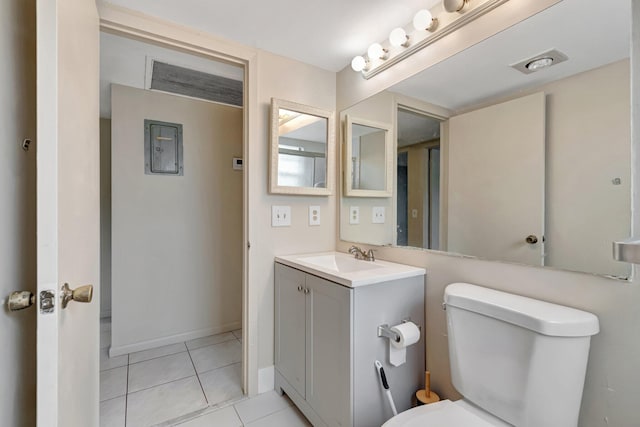 393 Fanshaw J, Boca Raton, FL 33434 - half bathroom featuring vanity, toilet, and tile patterned flooring