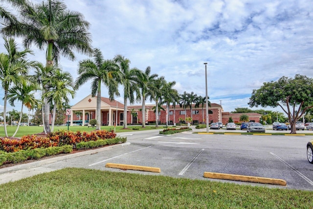 393 Fanshaw J, Boca Raton, FL 33434 - view of property featuring uncovered parking
