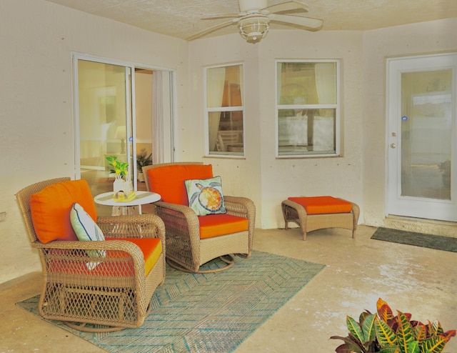 1985 SW Glenco St, Port Saint Lucie, FL 34953 - sunroom / solarium featuring a ceiling fan and unfinished concrete floors