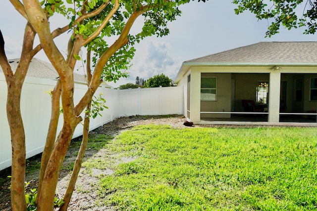 1985 SW Glenco St, Port Saint Lucie, FL 34953 - view of yard with a sunroom