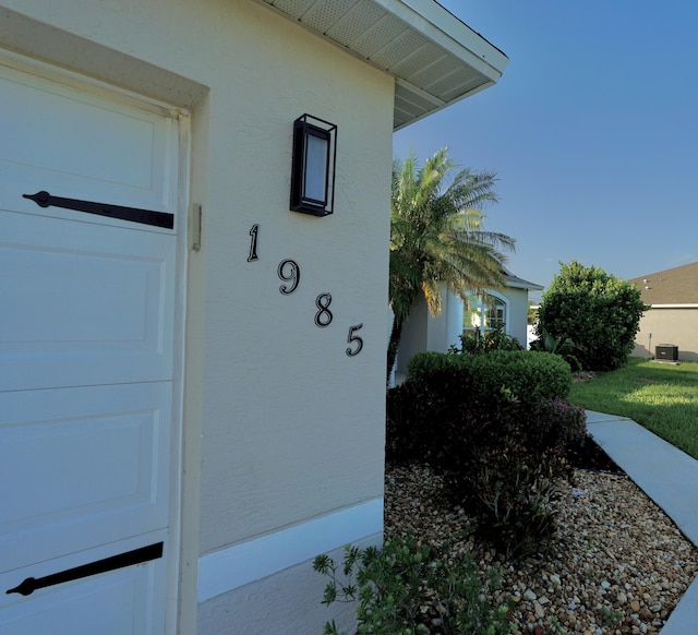 1985 SW Glenco St, Port Saint Lucie, FL 34953 - entrance to property with stucco siding