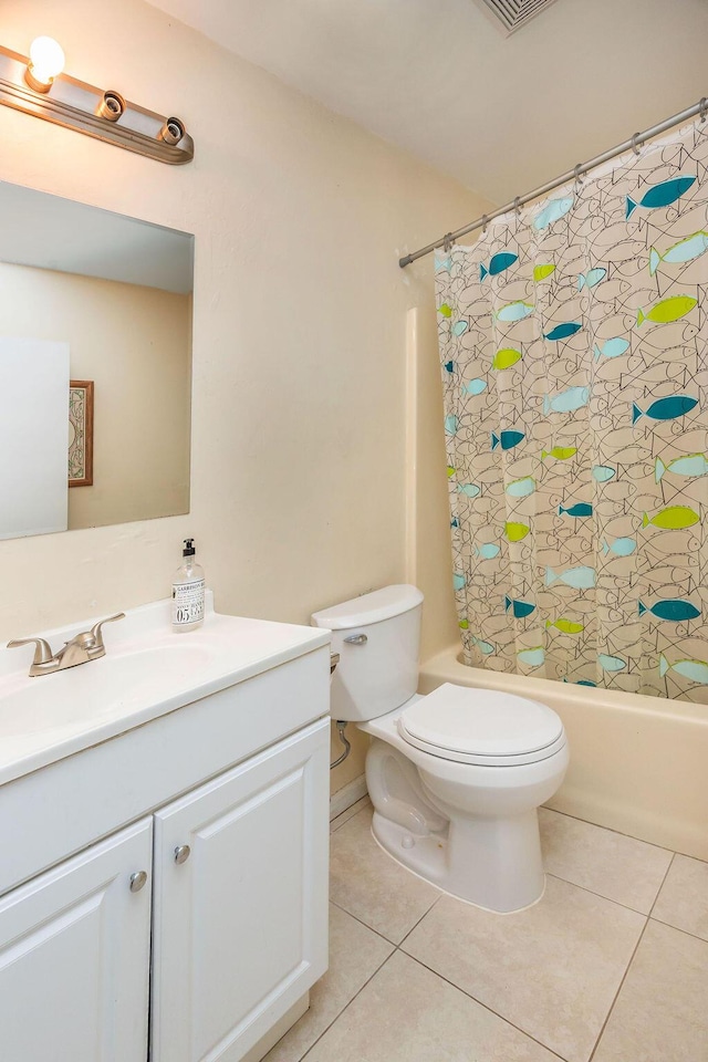 18564 48th Ave N, The Acreage, FL 33470 - full bathroom featuring vanity, tile patterned floors, toilet, and shower / bath combo with shower curtain