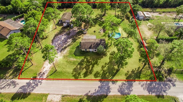 18564 48th Ave N, The Acreage, FL 33470 - aerial view of property and surrounding area featuring property boundaries highlighted and a pool area