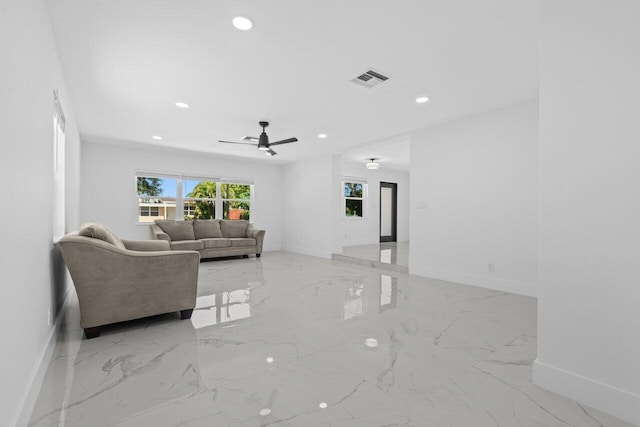 2949 NE 12th Ter, Pompano Beach, FL 33064 - living area with baseboards, light marble finish floors, and recessed lighting