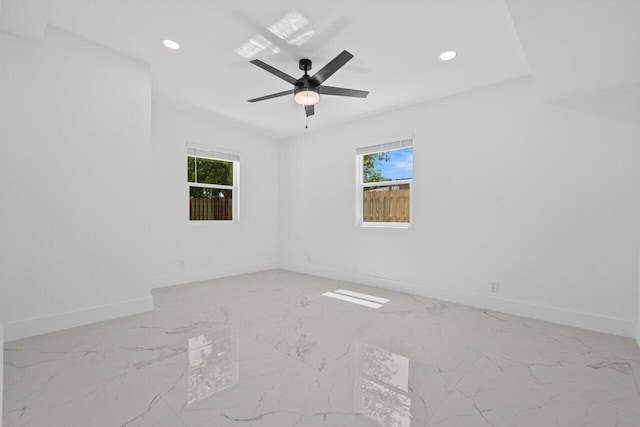 2949 NE 12th Ter, Pompano Beach, FL 33064 - empty room with baseboards, healthy amount of natural light, recessed lighting, and light marble finish floors