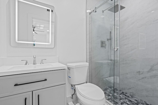 2949 NE 12th Ter, Pompano Beach, FL 33064 - bathroom featuring a shower stall, toilet, and vanity