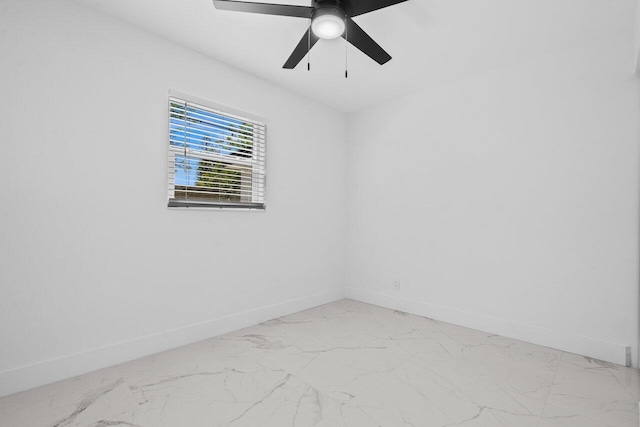 2949 NE 12th Ter, Pompano Beach, FL 33064 - unfurnished room featuring baseboards, light marble finish flooring, and a ceiling fan