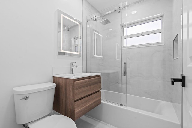 2949 NE 12th Ter, Pompano Beach, FL 33064 - full bathroom with toilet, vanity, and combined bath / shower with glass door