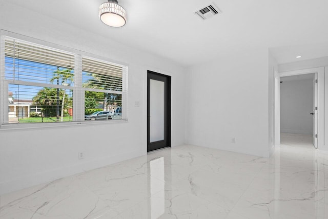 2949 NE 12th Ter, Pompano Beach, FL 33064 - unfurnished room featuring marble tiled flooring and baseboards