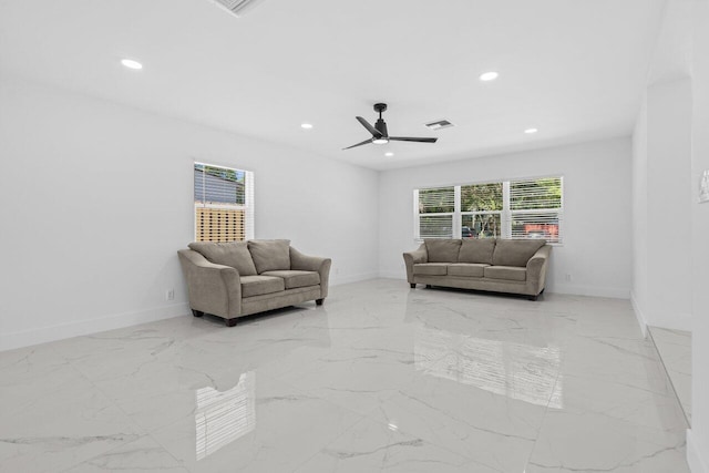 2949 NE 12th Ter, Pompano Beach, FL 33064 - living area with marble tiled floors, baseboards, recessed lighting, and a ceiling fan