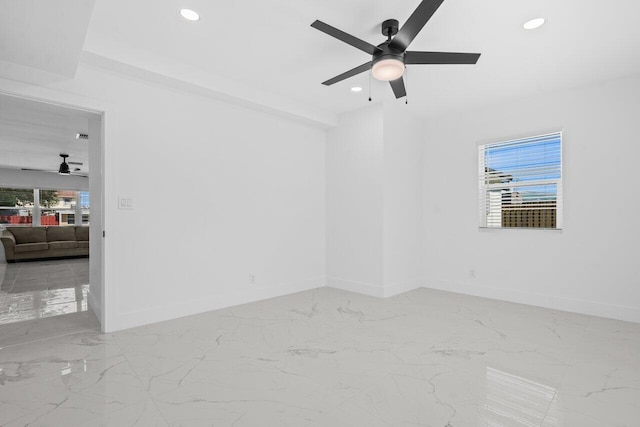 2949 NE 12th Ter, Pompano Beach, FL 33064 - unfurnished room featuring a ceiling fan, recessed lighting, baseboards, and marble tiled floors