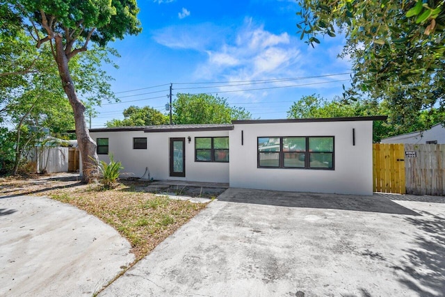 2949 NE 12th Ter, Pompano Beach, FL 33064 - view of front of house with stucco siding