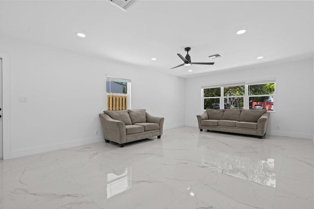 2949 NE 12th Ter, Pompano Beach, FL 33064 - living area with baseboards, marble finish flooring, a ceiling fan, and recessed lighting
